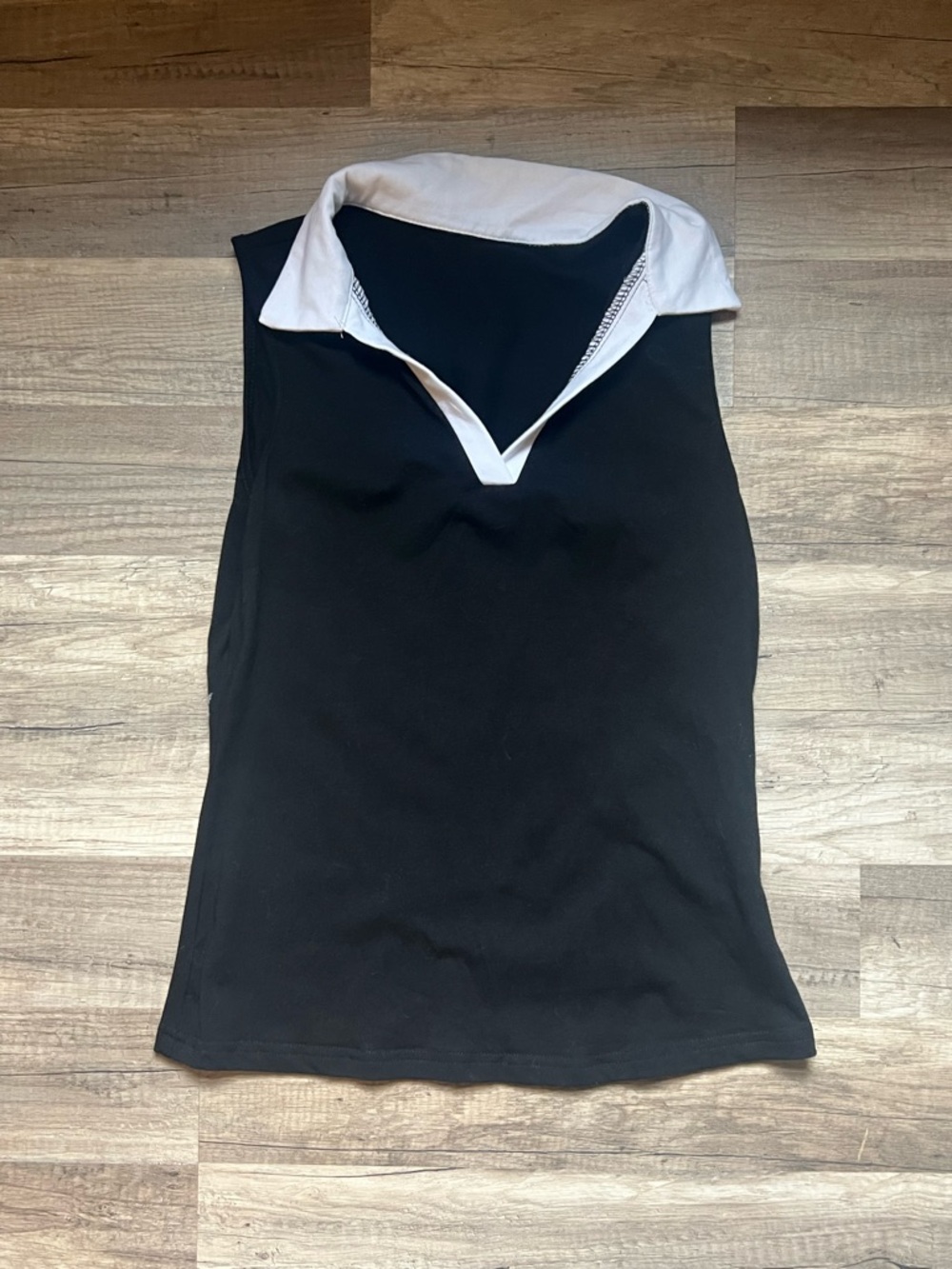 Sleeveless Black Top with White Collar - Classic Contrast Style